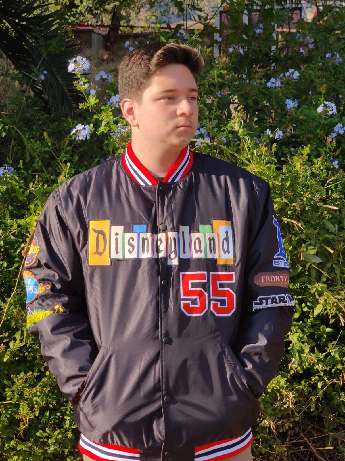 a Disneyland Sign Jacket w/stitched patches.