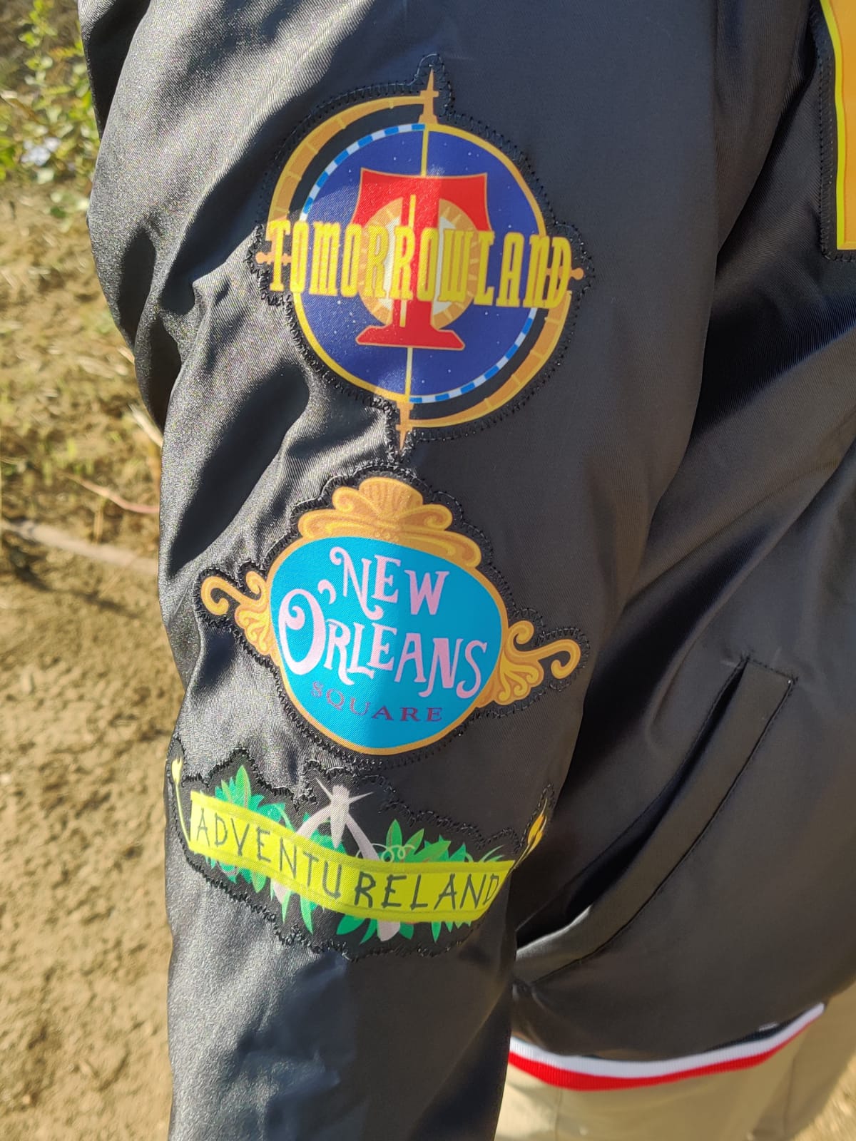 a Disneyland Sign Jacket w/stitched patches.