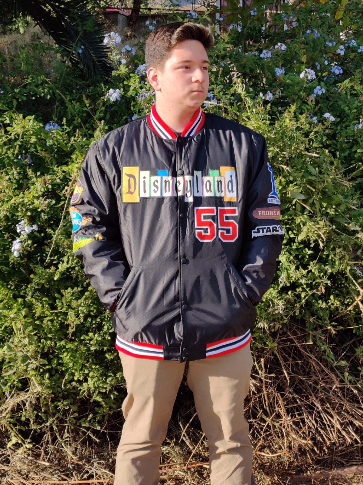 a Disneyland Sign Jacket w/stitched patches.