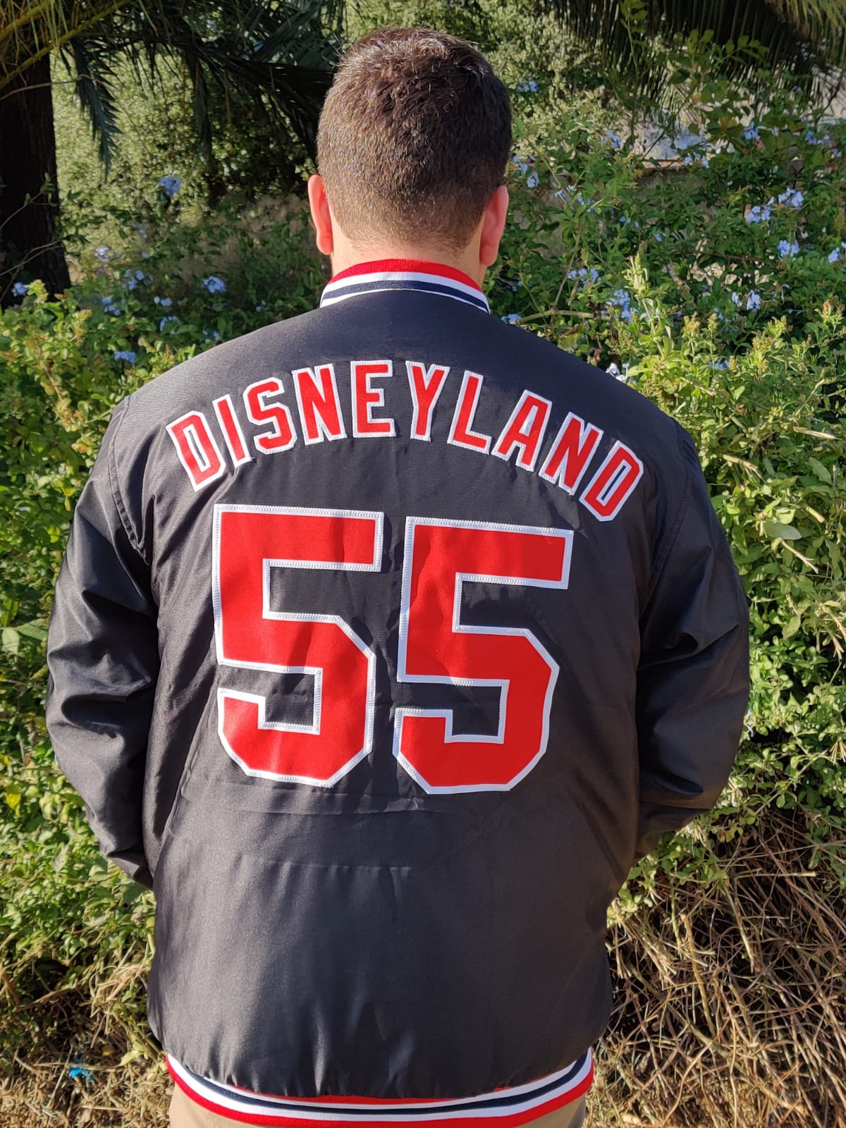 a Disneyland Sign Jacket w/stitched patches.
